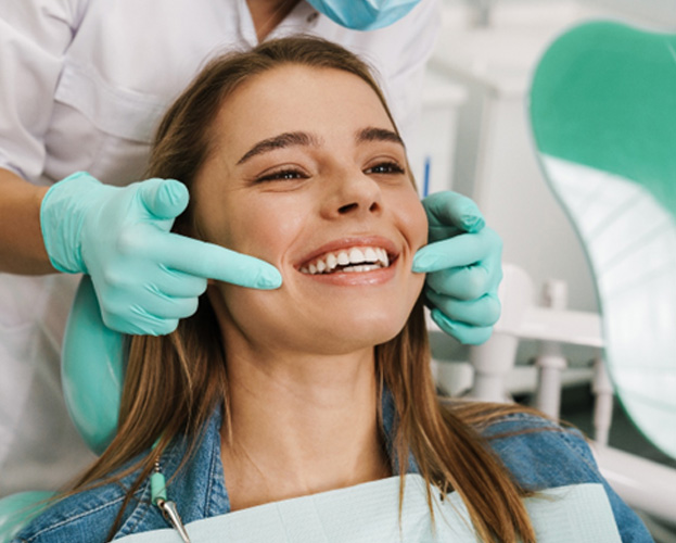 Woman smiling at the dentist